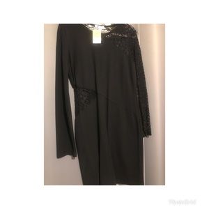 Black party dress with fishnet sleeve